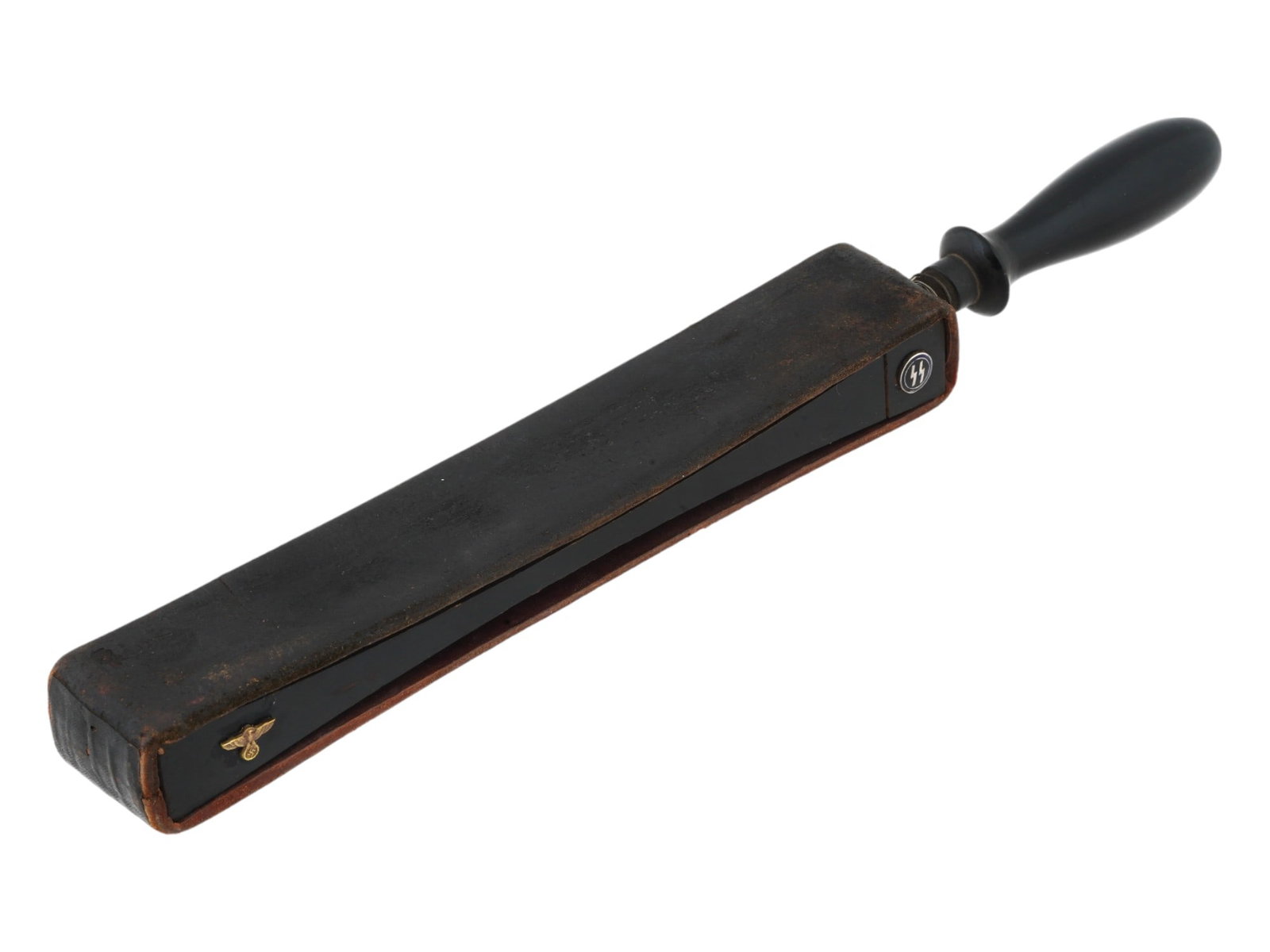 WWII TYPE GERMAN WAFFEN SS SHAVING RAZOR SHARPENER TOOL: A WWII type German Waffen SS leather shaving razor sharpener tool. It is a leather belt stretched over a wooden base with a comfortable handle and SS symbols on one side and an eagle with a swastika o