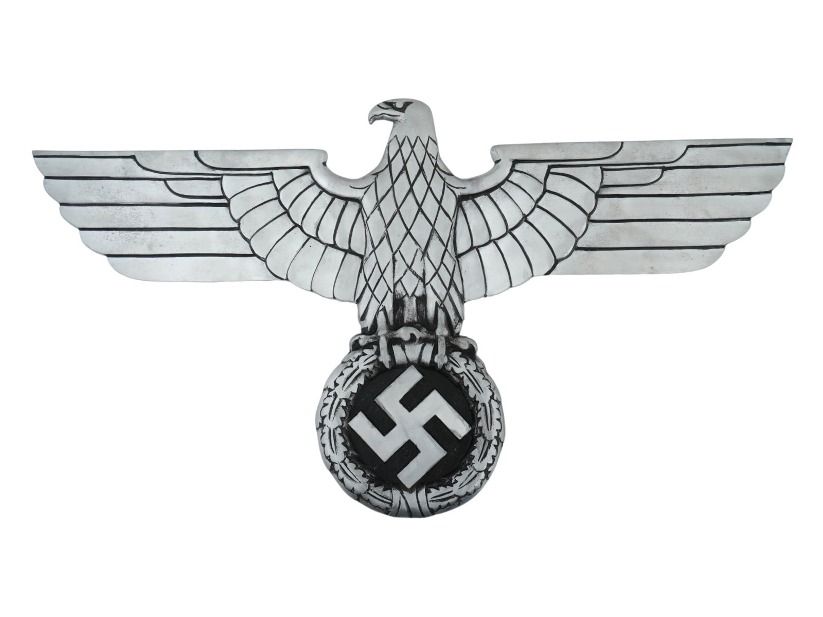 GERMAN WWII TYPE RAILROAD EAGLE PLATE: A large WWII Nazi German era type NSDAP figural solid aluminum railroad plate. The plate depicts a Nazi eagle with straight wings over a swastika on a black enamel ground, engraved with detailed patte
