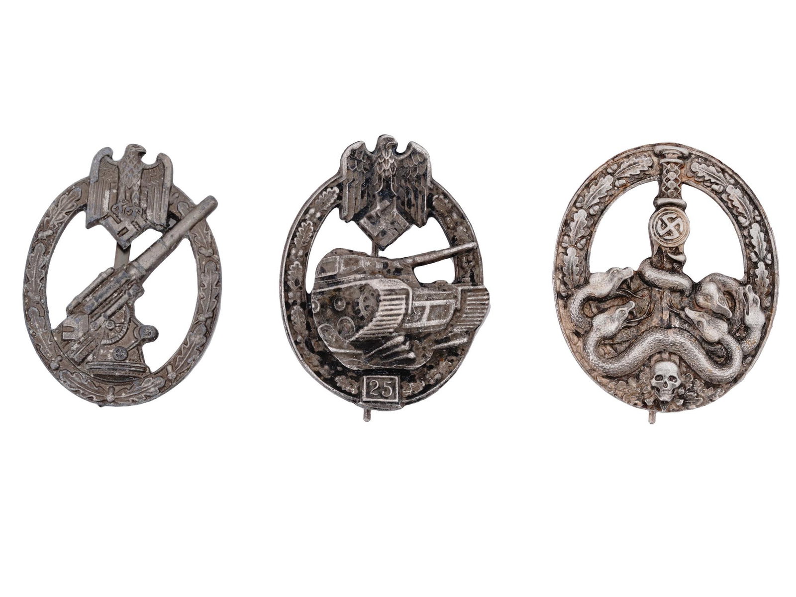 GROUP OF 3 GERMAN WWII BADGES: A lot of three World War II Nazi German military decorations. Army Tank Assault badge for 25 assaults, Anti-Partisan Bandit Warfare badge, Anti-Aircraft Flak Battle badge. Second World War Historical 