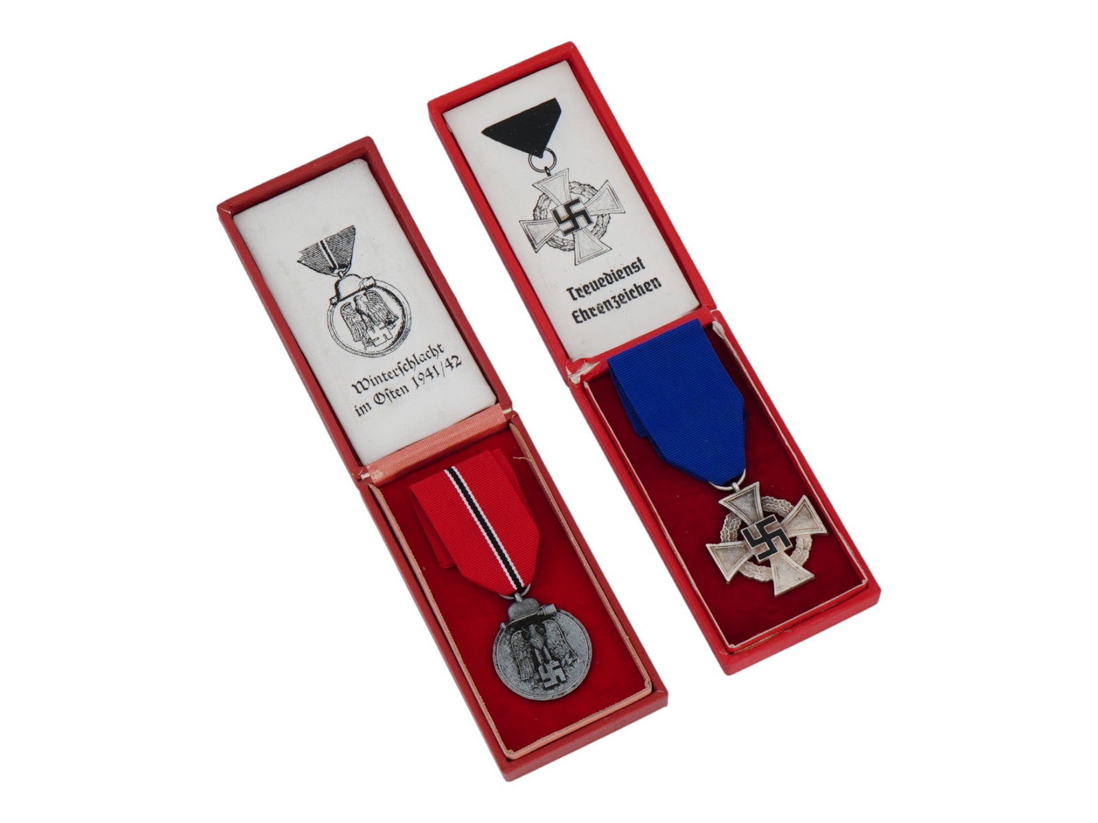 GERMAN WWII THIRD REICH MEDALS IN BOXES: A lot of two German Third Reich medals in the boxes. First is the Medal For The Winter Campaign In The East. In German, Medaille Winterschlacht im Osten 1941 to 42. The medal was established on May 26