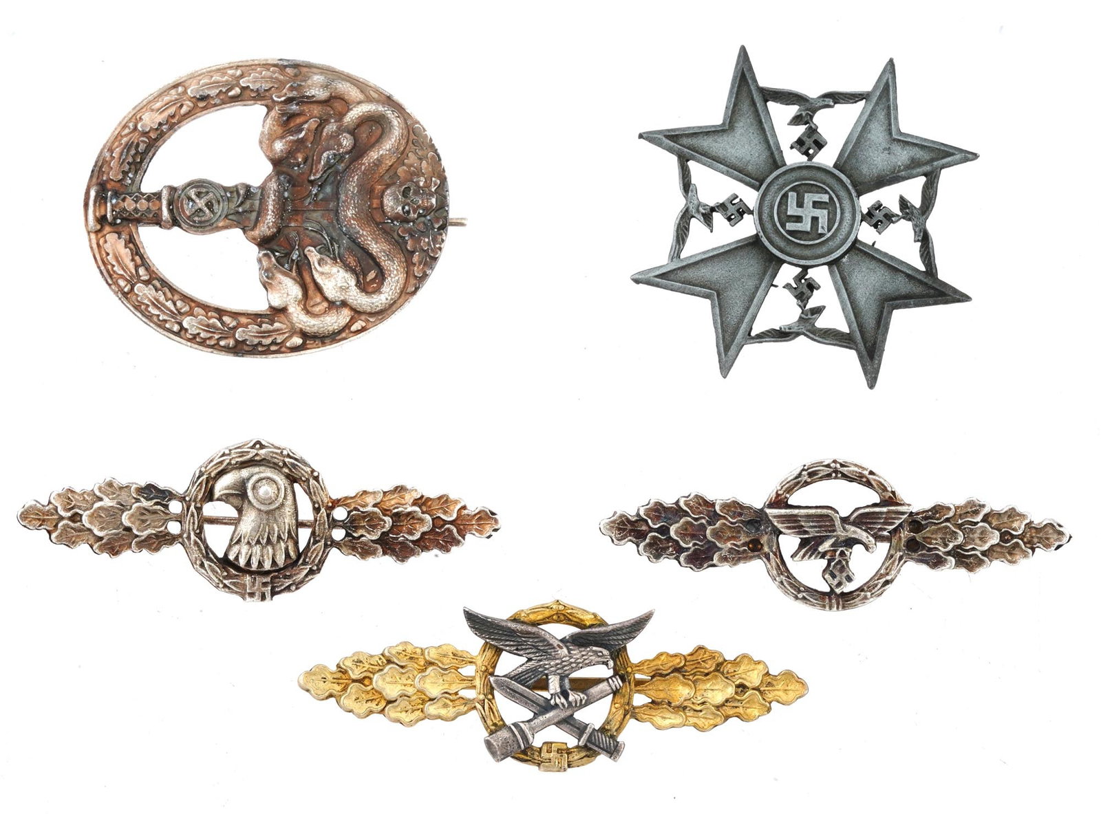GROUP OF FIVE GERMAN WWII MODEL BADGES: A lot of five WWII type Nazi German military decorations. Spanish Cross. Anti-Partisan Bandit Warfare badge. Luftwaffe Close Combat clasp. Luftwaffe Glider Squadron clasp. Luftwaffe Reconnaissance cla