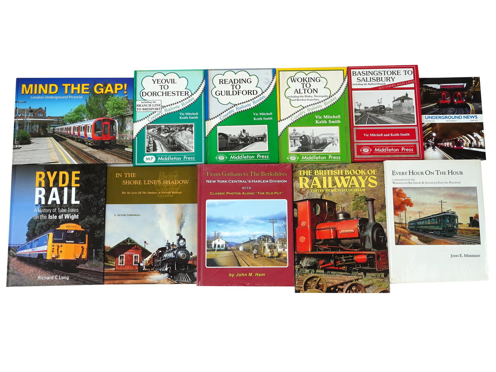 LOT OF ENGLISH RAILWAY TRANSPORT BOOKS AND ALBUMS: A collection of eleven English British and American books and albums about transport. The collection includes Mind The Gap London Underground Pictorial by Jason Cross; Ryde Rail a History of Tube Trai