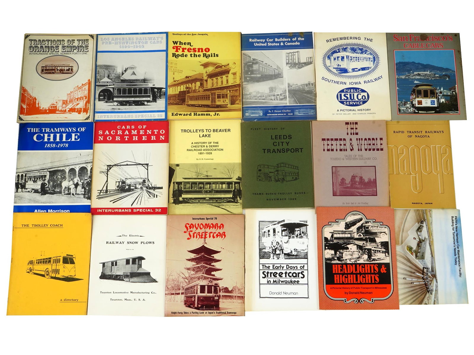 LOT AMERICAN ENGLISH RAILWAYS TRANSPORT BOOKS ALBUMS: A collection of eighteen American, English and Asian books and albums about transport. The collection includes the tramways of Chile by Allen Morrison; Tractions of The Orange Empire; Los Angeles Rail