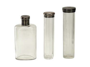 COLLECTION OF ENGLISH STERLING SILVER GLASS BOTTLES