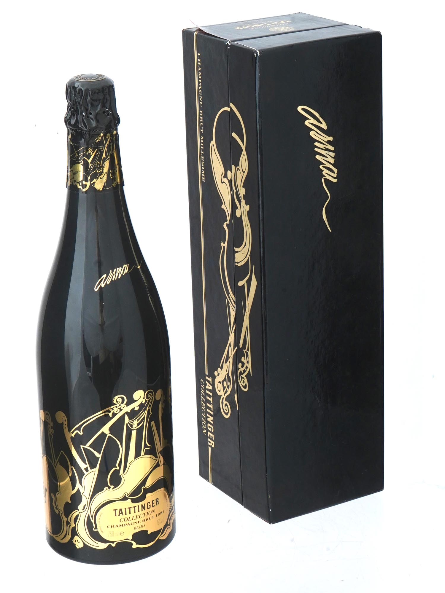 TAITTINGER CHAMPAGNE BRUT ARMAN MILLESIME IOB: An original French 1981 sealed bottle of Taittinger Collection Champagne Brut Arman in the original box. Produced in France. Imported by Kobrand Corporation New York. This wine was released in collabo