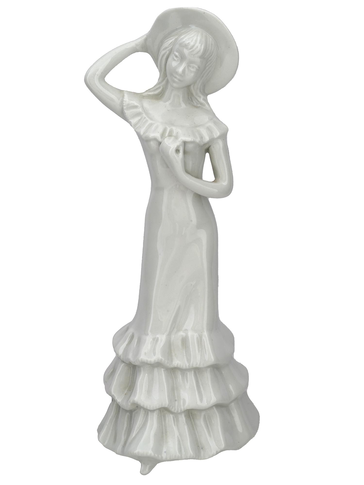 ITALIAN CAPODIMONTE WHITE PORCELAIN FIGURE OF LADY: A vintage Italian Capodimonte glazed white porcelain figure depicting a lady dressed in a dress and a hat. Circa: 1930s. Marked with a blue ink mark, on the bottom. Capodimonte porcelain is porcelain