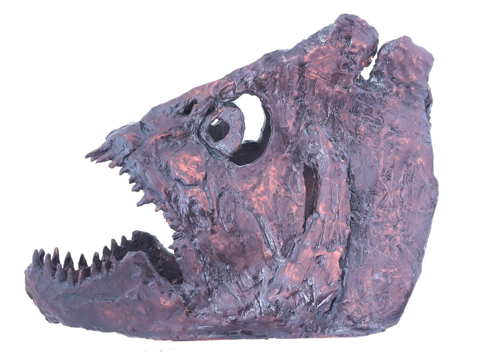 CERAMIC SCULPTURE OF A FISH SKULL BY HANS HEDBERG: A glazed ceramic sculpture by Hans Hedberg, 1917 to 2007, a Swedish-French sculptor known for his gigantic figures of fruit and eggs. The artwork represents a fish skull. Undated. Signed by the artist