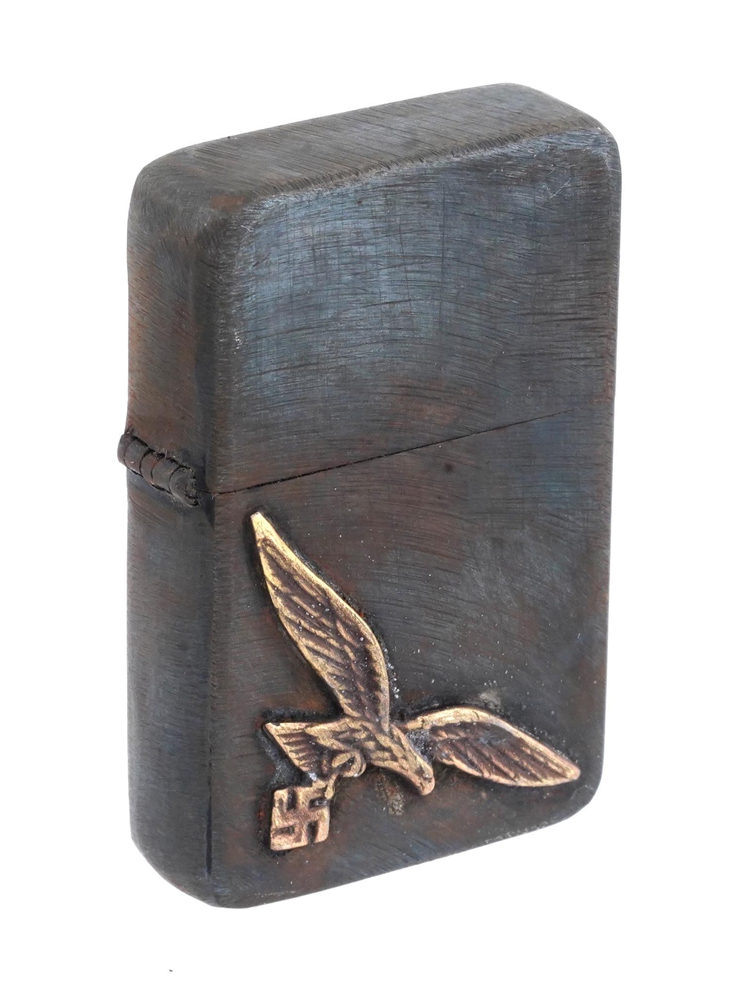 WWII GERMAN TYPE LUFTWAFFE PILOTS CIGARETTE LIGHTER: A World War II Nazi German type alloy cigarette lighter. The exterior of the lighter is adorned wwith a Luftwaffe eagle emblem affixed to the front. Marked on the bottom: Ges Gesch, 1944, RZM, 195 mar