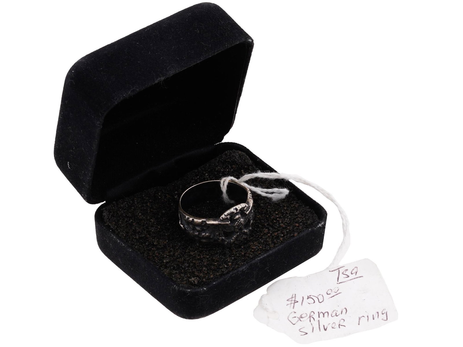 WWII NAZI GERMAN THIRD REICH POLICE SILVER RING: A WWII Nazi German Third Reich Police Silver ring. The ring is adorned with an engraved Nazi eagle emblem holding a swastika insignia surrounded by a laurel wreath to the center of the oak leaves band