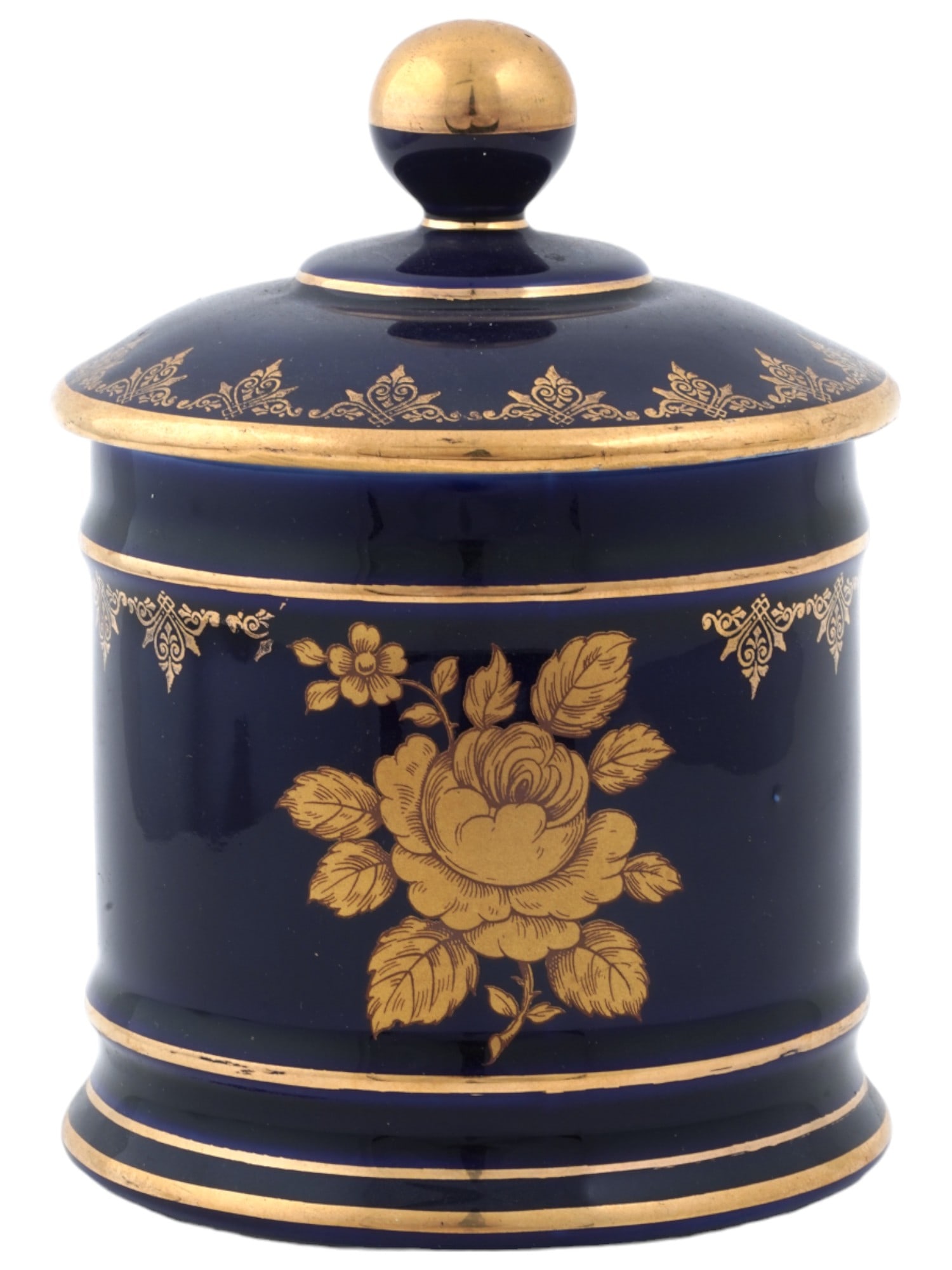 VINTAGE FRENCH LIMOGES COBALT BLUE GOLD PORCELAIN JAR: A vintage French Limoges cobalt blue and 22k gold lidded porcelain jar. Adorned with a delicate flower motif, this jar exudes elegance and sophistication. The cobalt blue hue provides a rich backdrop 