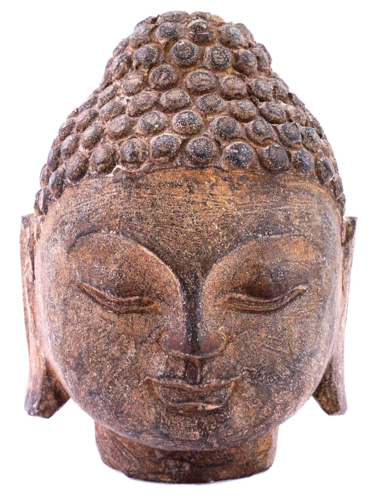 STONE CARVED HEAD OF BUDDHA WITH CLOSED EYES: A stone-carved head of Buddha, carved with precision and imbued with profound symbolism, this sculpture captures the essence of Buddhist philosophy and enlightenment. The tranquil expression, with clo