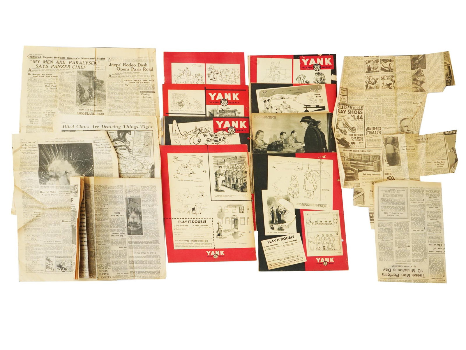 WWII AMERICAN NEWSPAPERS AND YANK MAGAZINE ISSUES: A lot of WWII era American and British publications and newspaper cutouts. A total of 13 items, including sheets from The Stars and Stripes, The People, and The Sunday Chronicle newspapers, as well as