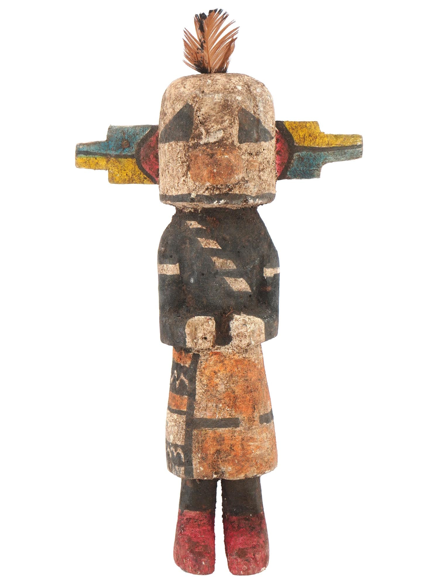SOUTHWESTERN NATIVE AMERICAN KACHINA HOPI DOLL: A Southwestern Native American Kachina Hopi doll with a feather. The doll is made from hand carved wood. The figurine is adorned with hand painted traditional ornaments, and decorated with a feather o