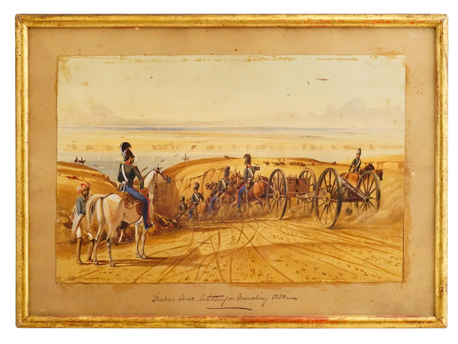 ANTIQUE BRITISH RAJ MILITARY WATERCOLOR PAINTING: Watercolor on paper painting. British, mid to late 19th century. The artwork depicts cavalry descending from the baked hill. Titled underneath, Madras Horse Artillery in Marchery Order. Unsigned. Card