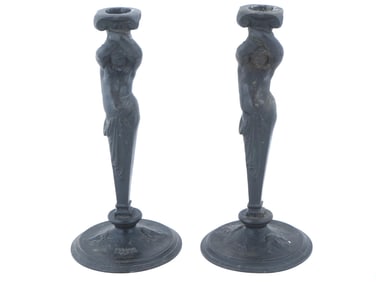 ANTIQUE CAST IRON CANDLESTICKS WITH ATLAS FIGURES