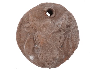 ANCIENT ROMAN ROUND CLAY PLAQUE WITH A BULL HEAD