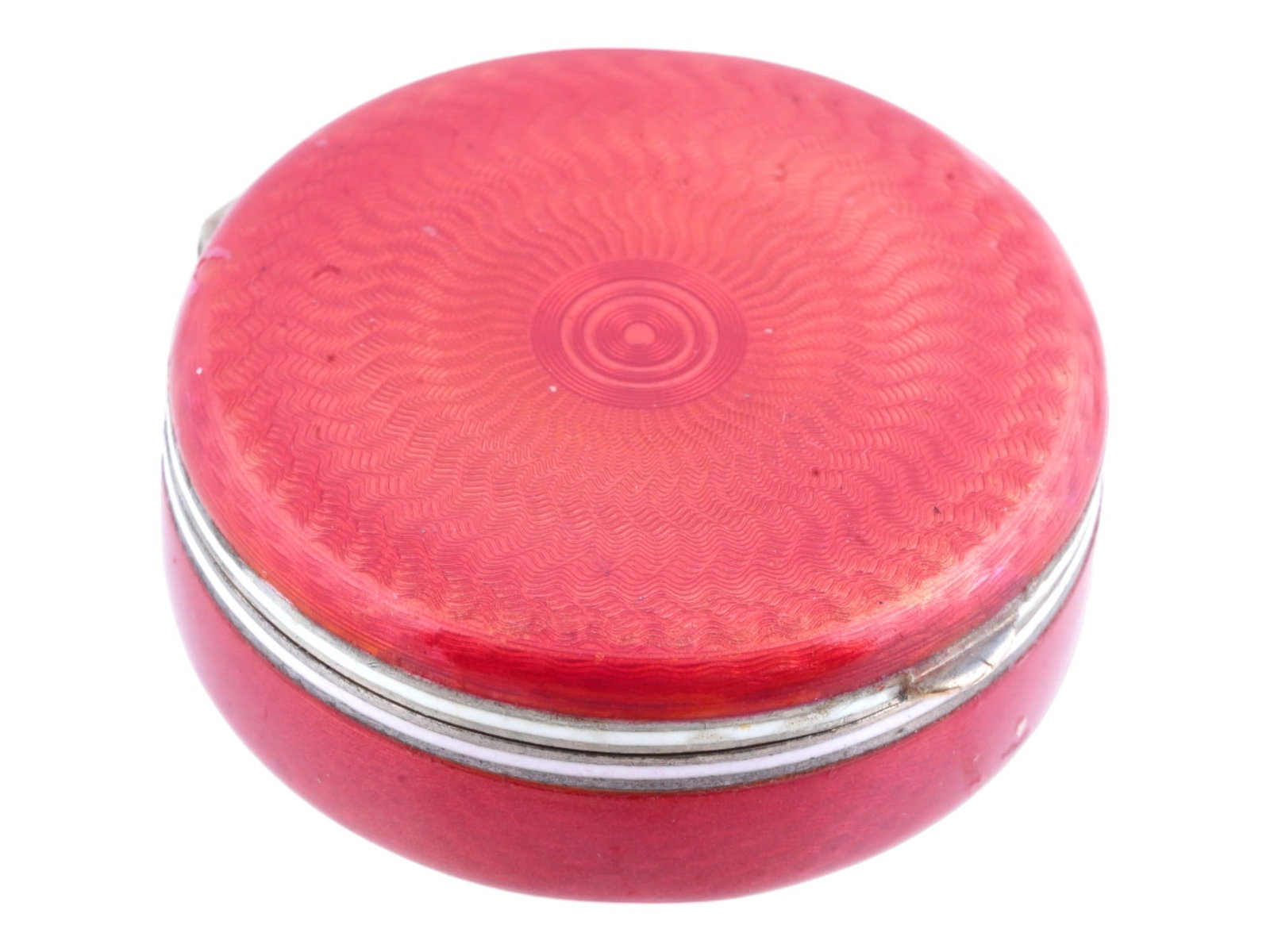 IMPERIAL RUSSIAN SILVER GUILLOCHE ENAMEL PILL BOX: An Imperial Russian round silver pill box with hinged lid. The exterior is decorated with pink guilloche enamel. Hallmark of 88 silver standard and makers mark IB for Ivan Britzin are on the inside. T