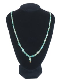NECKLACE WITH ANCIENT TURQUOISE BEADS AND GOLD ACCENTS