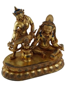 TIBETO CHINESE BUDDHIST GILT BRONZE FIGURAL GROUP