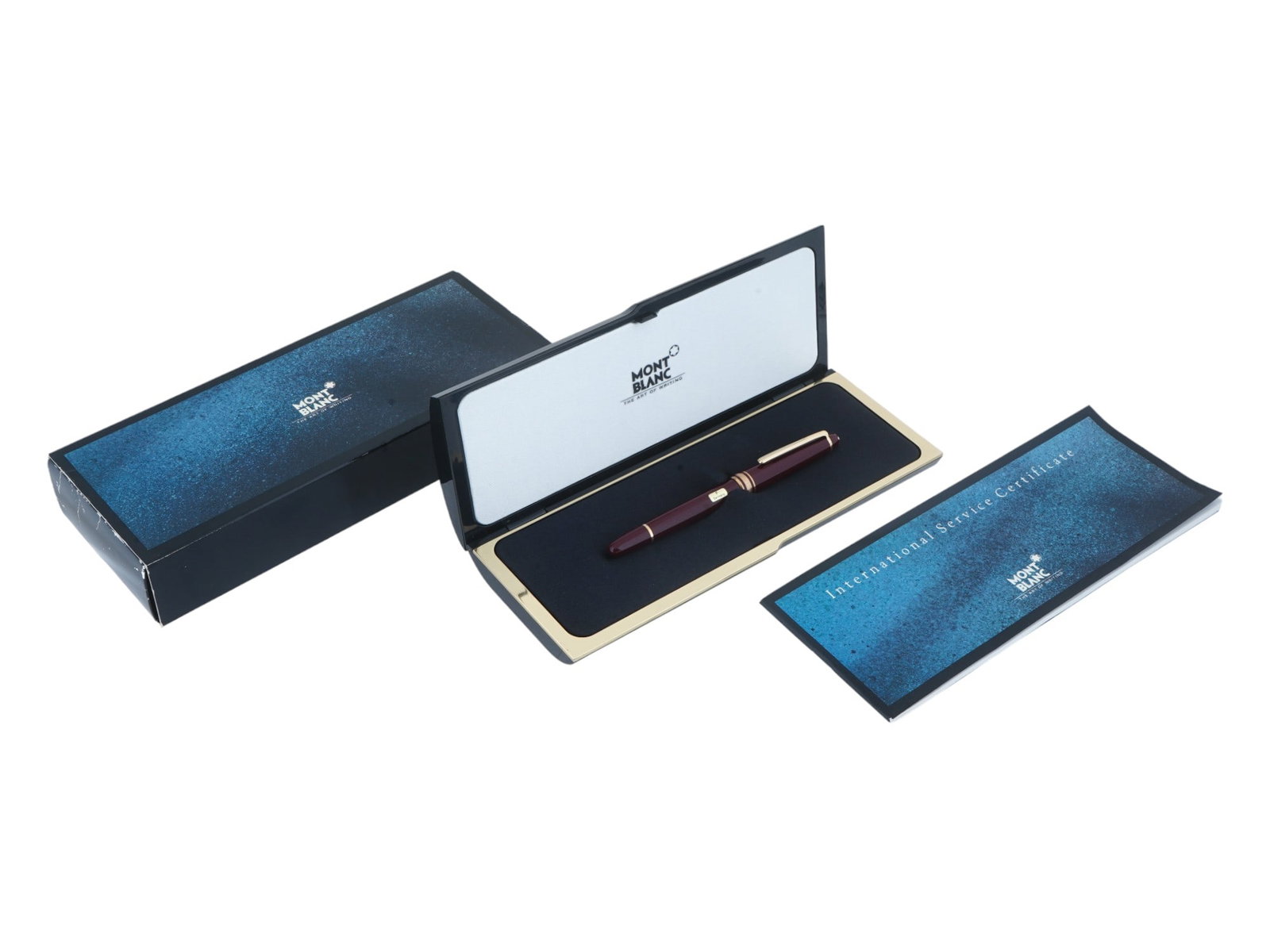 MONTBLANC MEISTERSTUCK GOLDEN RESIN FOUNTAIN PEN: A German Mont Blanc Meisterstuck black resin and gold plated fountain pen. The corps is made of burgundy resin and gold plated. Circa: 1970s. The top of the cap is adorned with a representation of the
