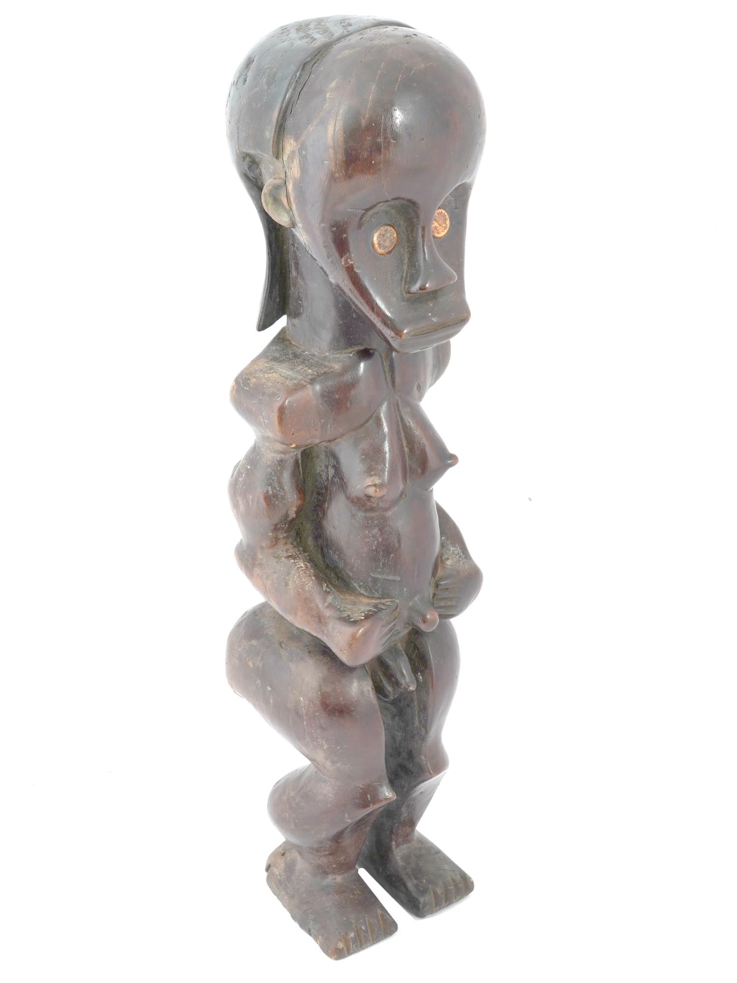 GABONESE FANG NTUMU CARVED WOOD RELIQUARY FIGURE: Hand carved wooden figurine from Gabon, Central Africa, art of the Fang Ntumu ethnic sub group. The piece is a byeri, the representation of an ancestor used in worship ceremonies. This figurine repres
