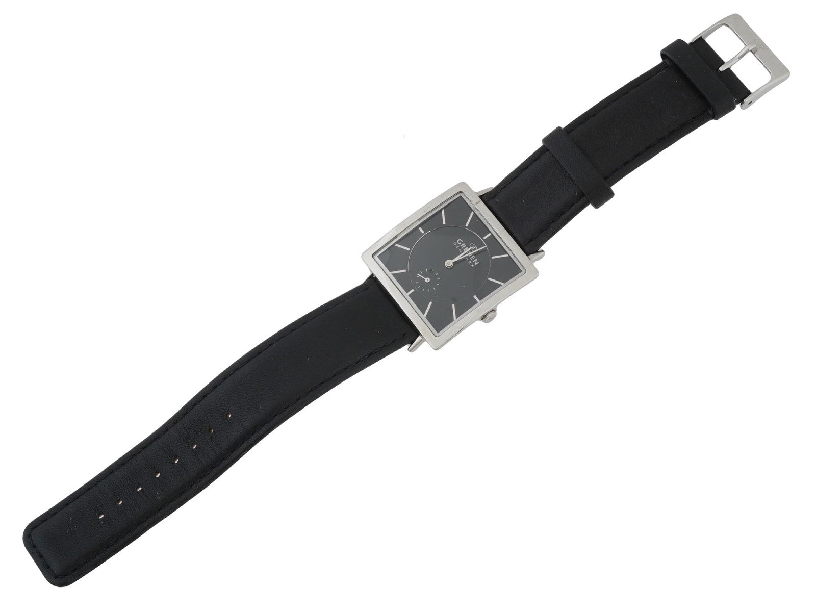 SKAGEN GRENEN MENS STAINLESS STEEL WRISTWATCH: A vintage mens stainless steel wristwatch by Skagen, a Danish jewelry brand established in 1989. Grenen collection. Ca. 2000s. Slim Japan quartz movement. Water resistant. Square case, polished bezel,