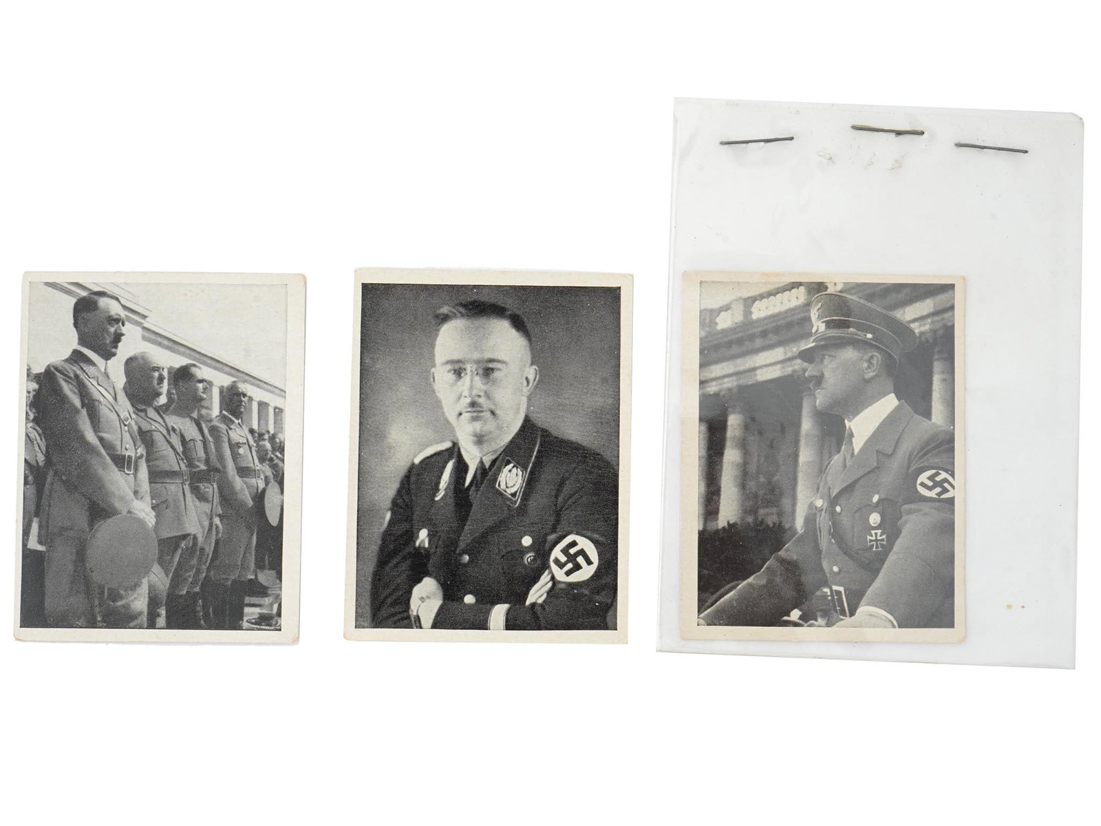 WWII ERA AUSTRIAN ADOLF HITLER CIGARETTE CARDS: A lot of World War II era cigarette cards issued by Austria Tabakwerke. From the series titled Adolf Hitler und sein Weg zu Grossdeutschland, Adolf Hitler and His Path to Greater Germany, after 1939. 