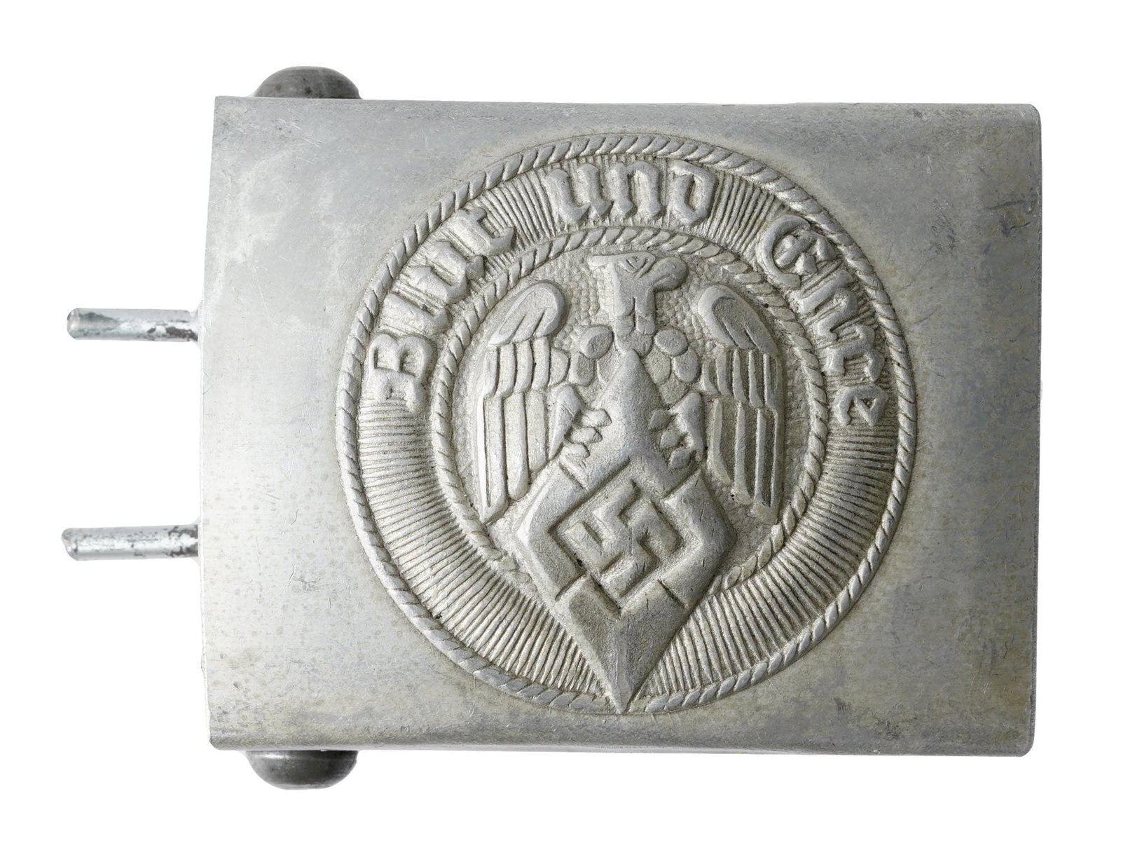WWII GERMAN NAZI HITLER YOUTH BELT BUCKLE FOR EM: A WWII German Nazi Hitler Youth belt buckle for an enlisted man. The front is engraved with a motto in German, Blut und Ehre, translated to Blood and Honor, and the Hitler Youth eagle clutching the HJ