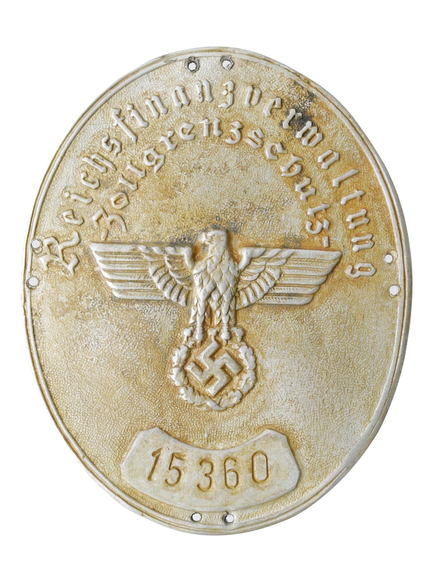 WWII NAZI GERMAN BORDER CUSTOMS OFFICIAL SLEEVE SHIELD: A WWII Nazi German border customs official sleeve shield. Features a Reichsadler along with the inscription Reichsfinanzverwaltung Zollgrenzschutz, which means National Finance Administration Customs 