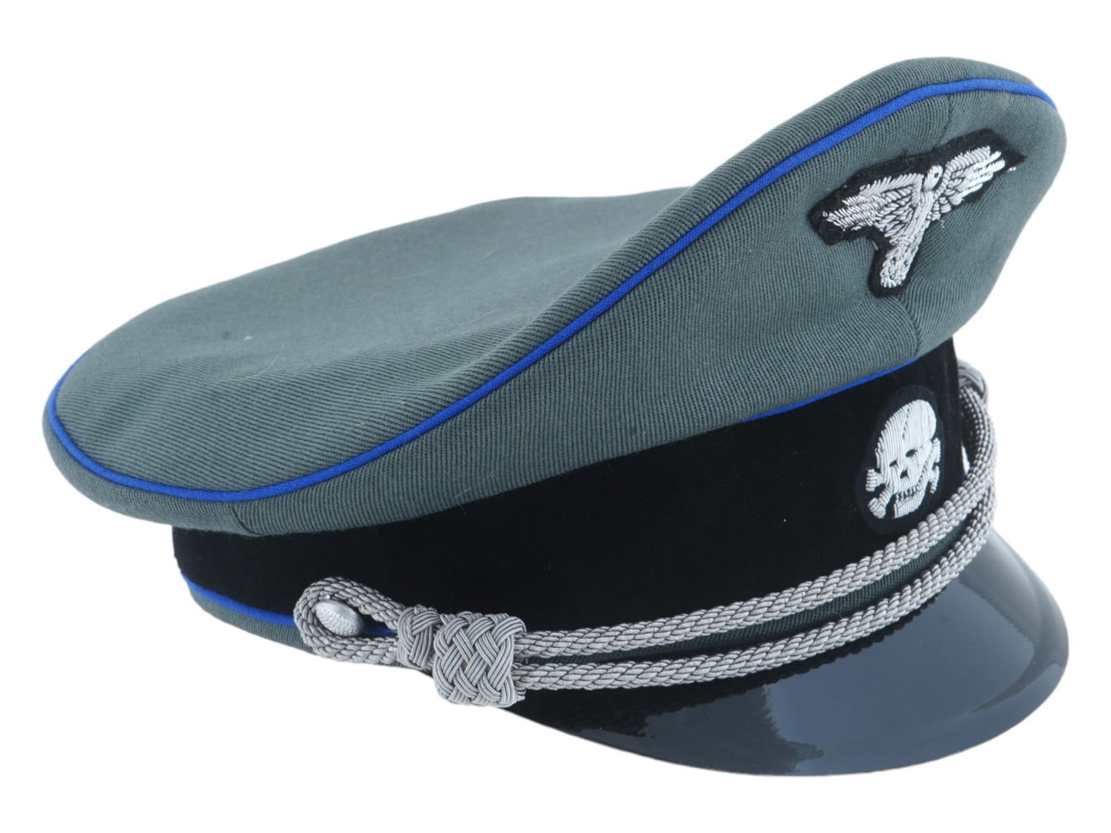 WWII TYPE GERMAN WAFFEN SS OFFICER VISOR CAP: A WWII type German Third Reich waffen SS officer visor cap. The body of the hat is made of gray wool with a black velvet band. Features a Totenkopf skull and bones emblem mounted on the front along wi