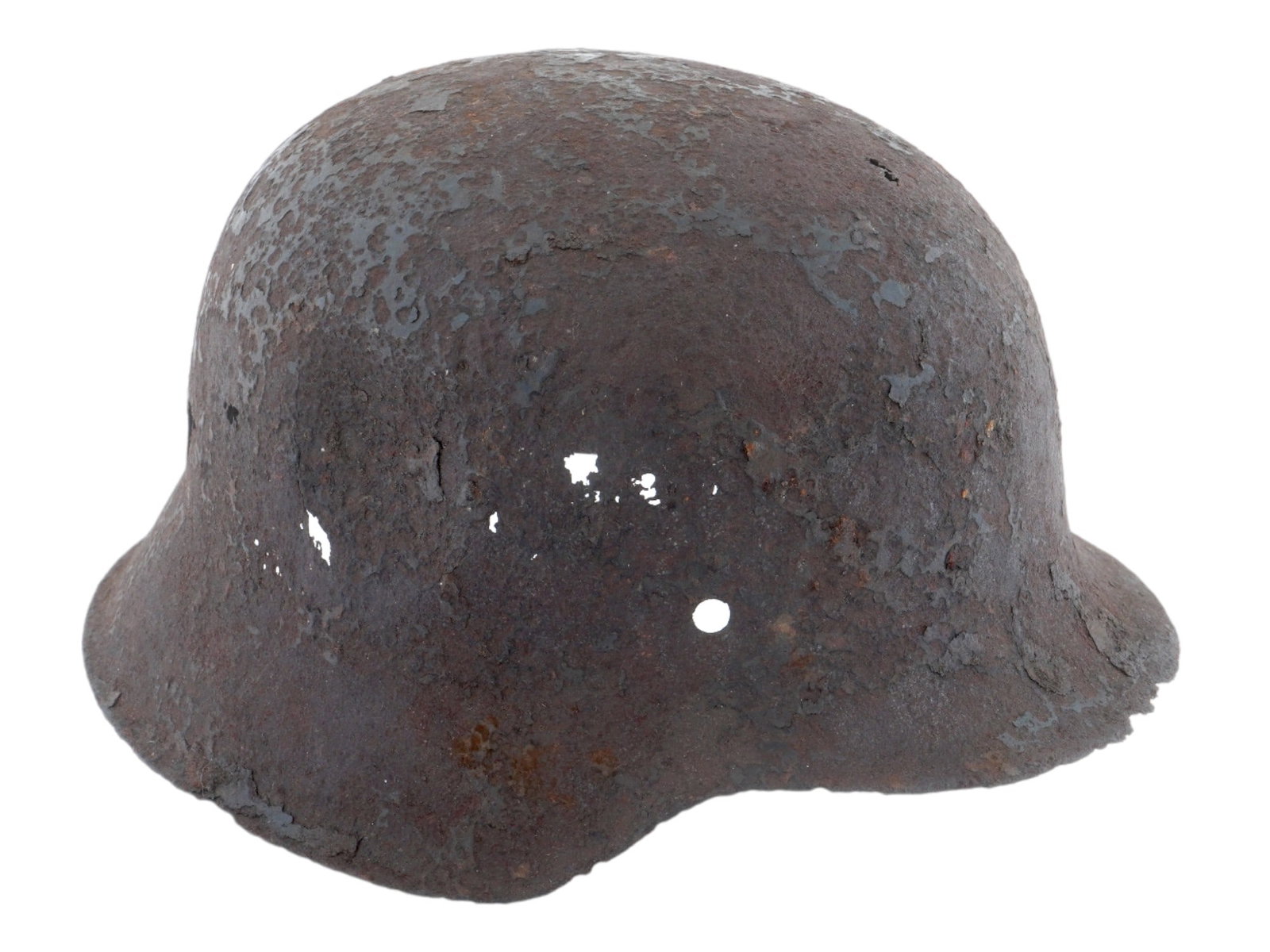 WWII TYPE NAZI GERMAN MILITARY STEEL HELMET STAHLHELM: A World War II Nazi German military helmet, the Stahlhelm. A steel helmet intended to protect against shrapnel and fragments of grenades. Distinctive coal scuttle shape, matte black color with damage.