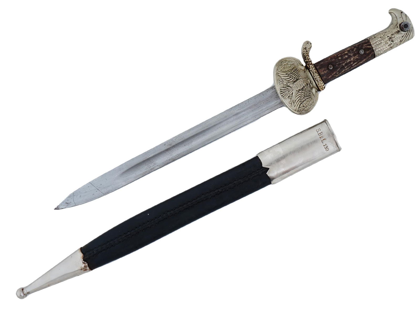 WWII NAZI GERMAN EAGLE POLICE DAGGER W SCABBARD: A World War II Nazi German Third Reich type police dagger. The stainless steel blade is garnished with etching depicting a swastika and the motto in German, Zur Erinnerung An Meine Dienstzeit, In Memo