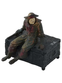 CAST IRON PIRATE ON CHEST MUSIC BOX BY HIRSCH CO