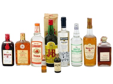 COLLECTION OF ALCOHOL DRINKS IN VINTAGE BOTTLES