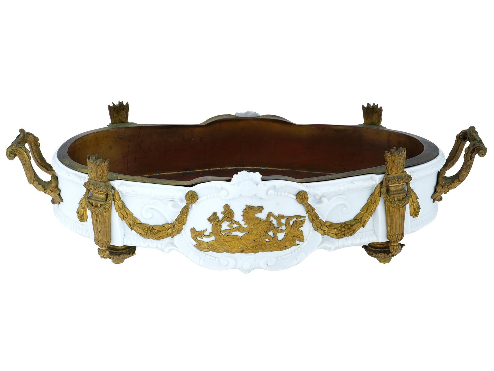 ANTIQUE GERMAN VOLKSTEDT BRONZE PORCELAIN JARDINIERE: An antique German Volkstedt white porcelain handled jardiniere. This piece features a flat white body adorned with intricate relief decor. The jardiniere is further enhanced by central cartouches on b
