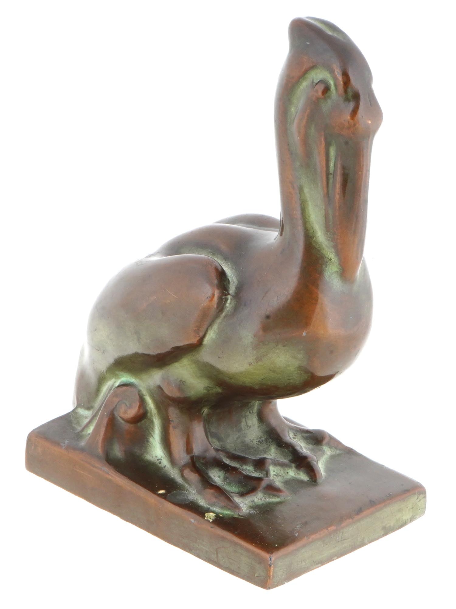 PATINATED BRONZE SCULPTURE OF A PELICAN SIGNED: Patinated cast bronze sculpture representing a seated pelican. Early to mid-20th century, presumably ca. 1930s. Embossed mark JF Co in rhombus on the backside. The item can be used as a book end. Coll