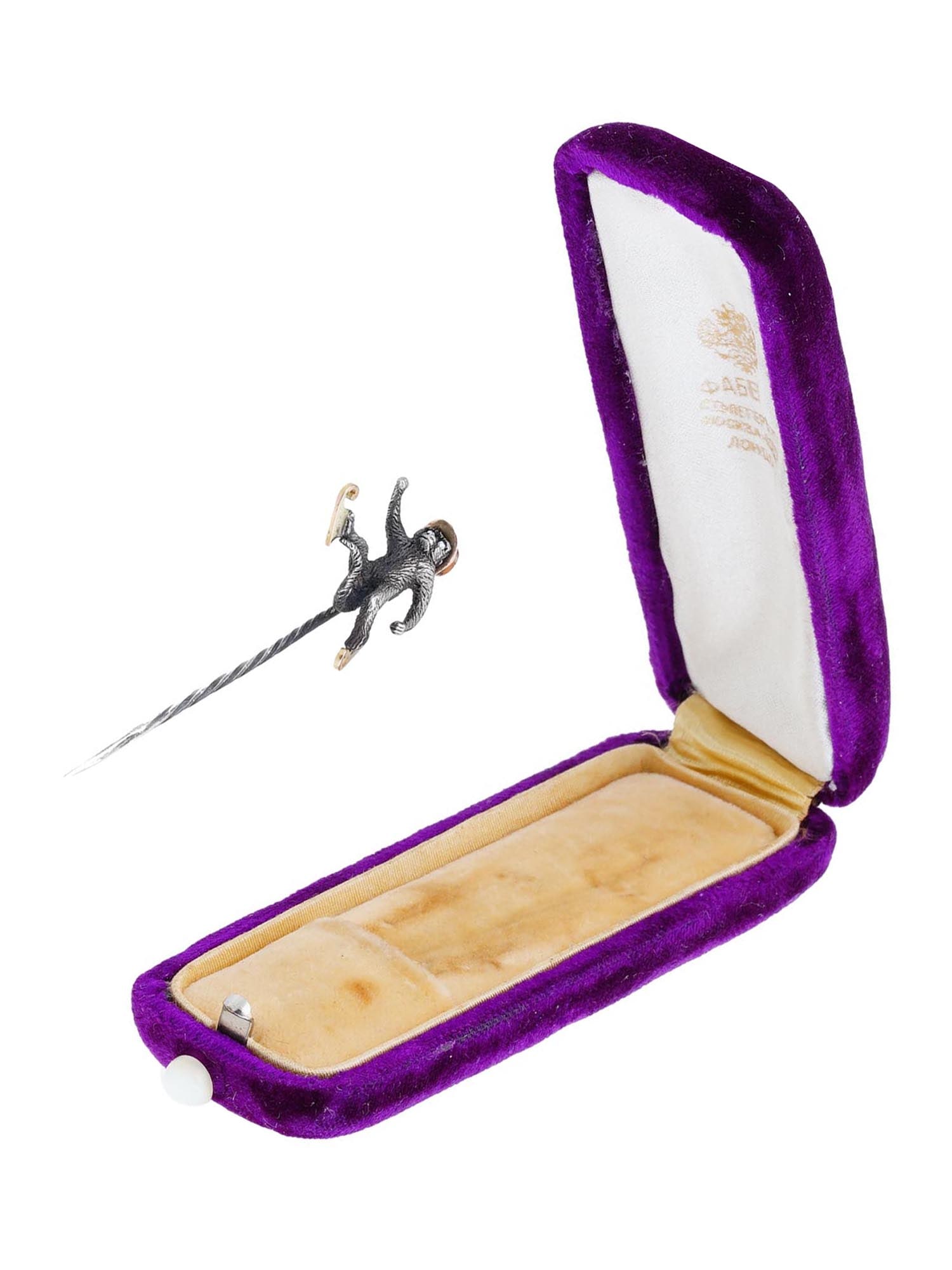 RUSSIAN GOLD SILVER DIAMOND MONKEY BROOCH PIN IOB: A Russian silver figurative brooch pin. The piece represents a monkey in gold skates and a rose gold hat, the eyes are set with diamonds. Hallmarks of 88 silver and 56 gold standards are on the pin. T