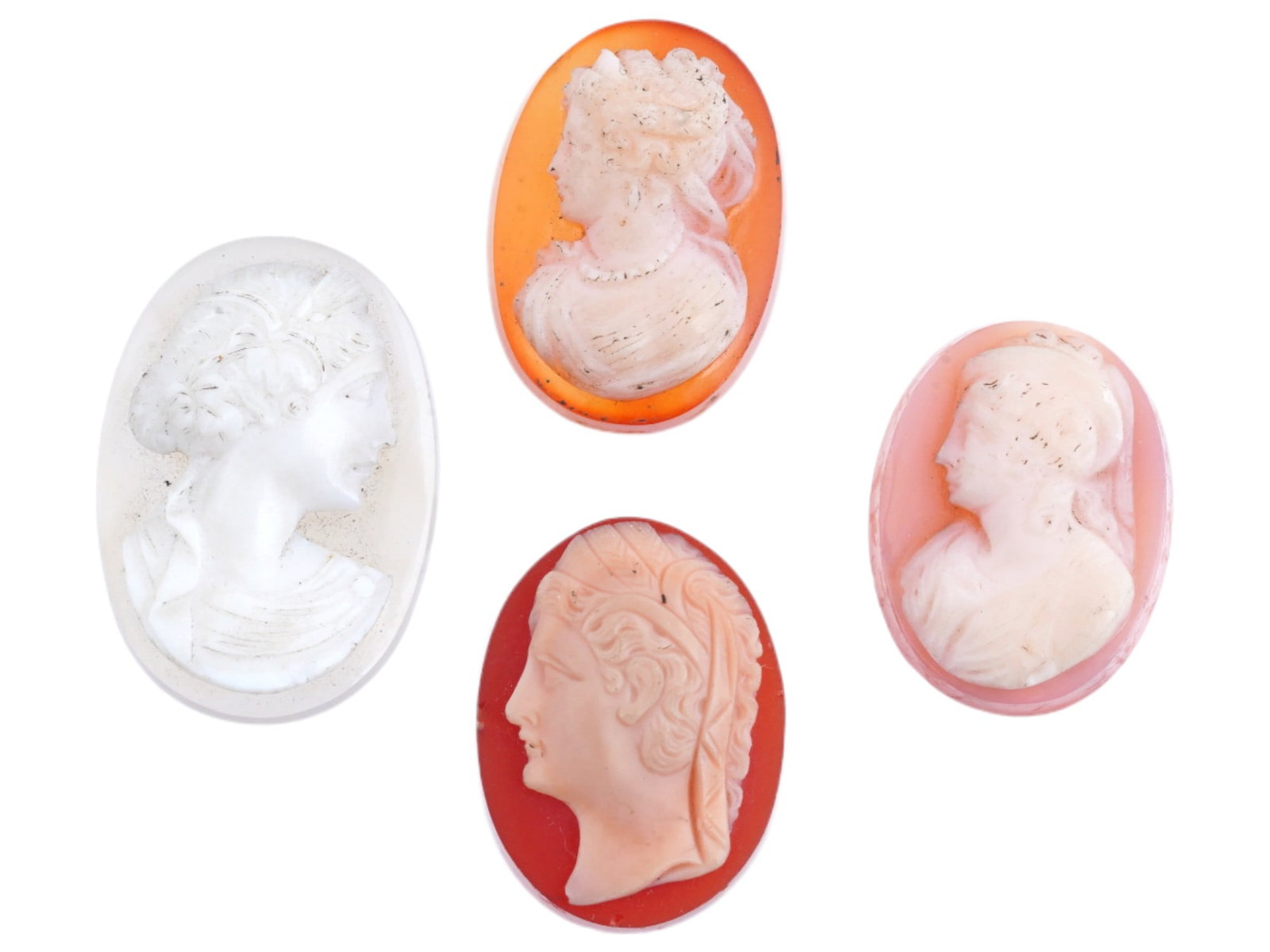 ANTIQUE ROMAN AGATE CAMEO FEMALE PORTRAITS: A collection of four antique Roman style carved agate cameos, featuring a female portraits. These exquisite pieces, reminiscent of the European tradition of collecting classical antiquities, showcase 