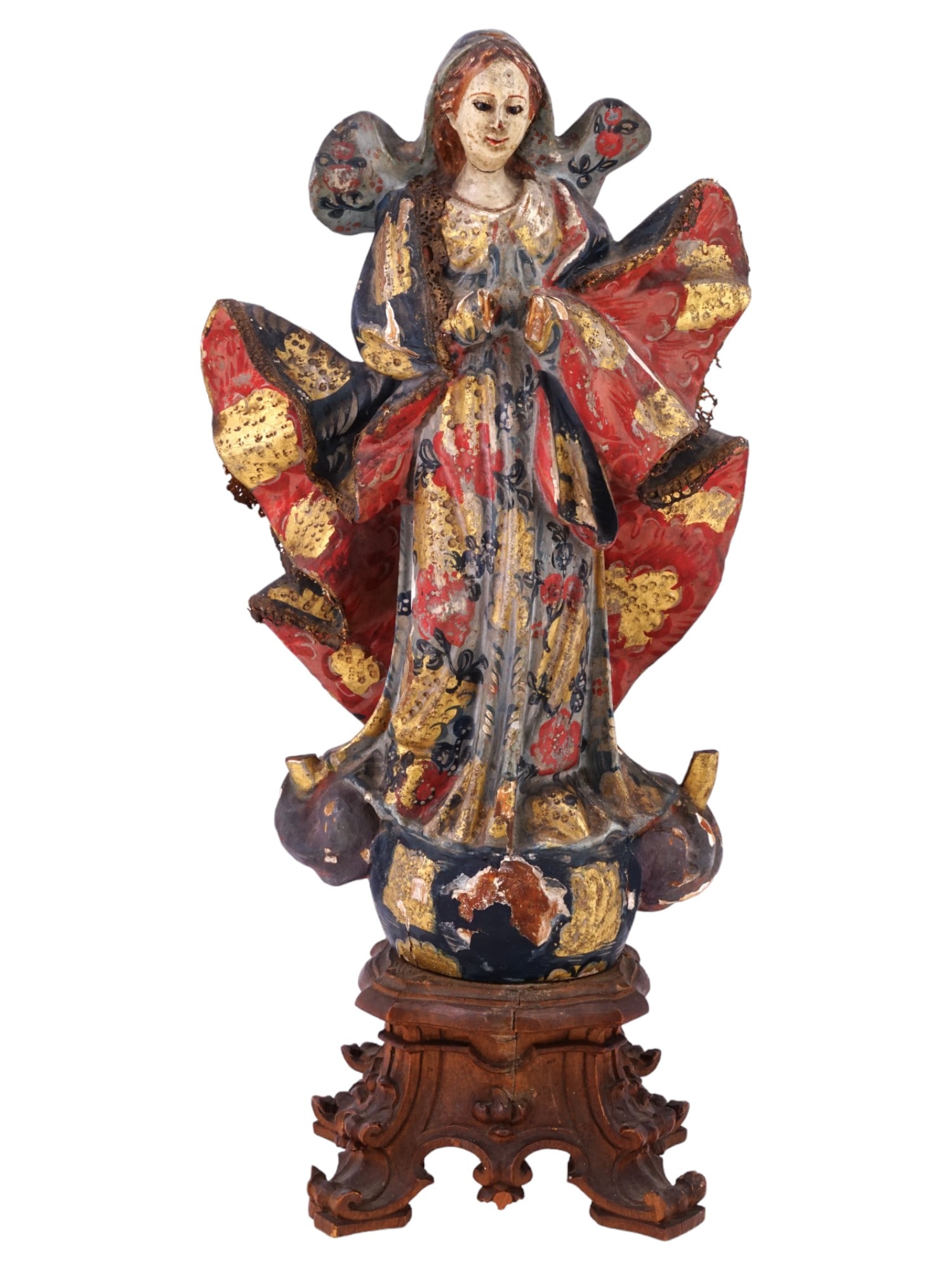 ANTIQUE SPANISH COLONIAL WOODEN VIRGIN MARY SCULPTURE: An antique Spanish colonial South American wooden polychrome sculpture of the Virgin Mary. Circa mid 18th to early 19th century. The standing Virgin Mary is depicted in a flowing wide robe with a cloa