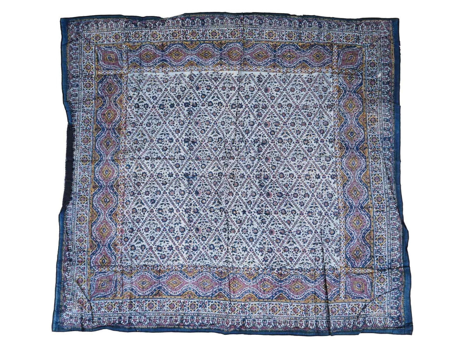 CLASSIC ANTIQUE PERSIAN KALAMKARI COTTON TEXTILE: An antique Persian Kalamkari cotton textile. The textile is adorned with traditional polychrome floral, foliage, and paisley patterns. Circa: late 19th century to early 20th century. Kalamkari or chit