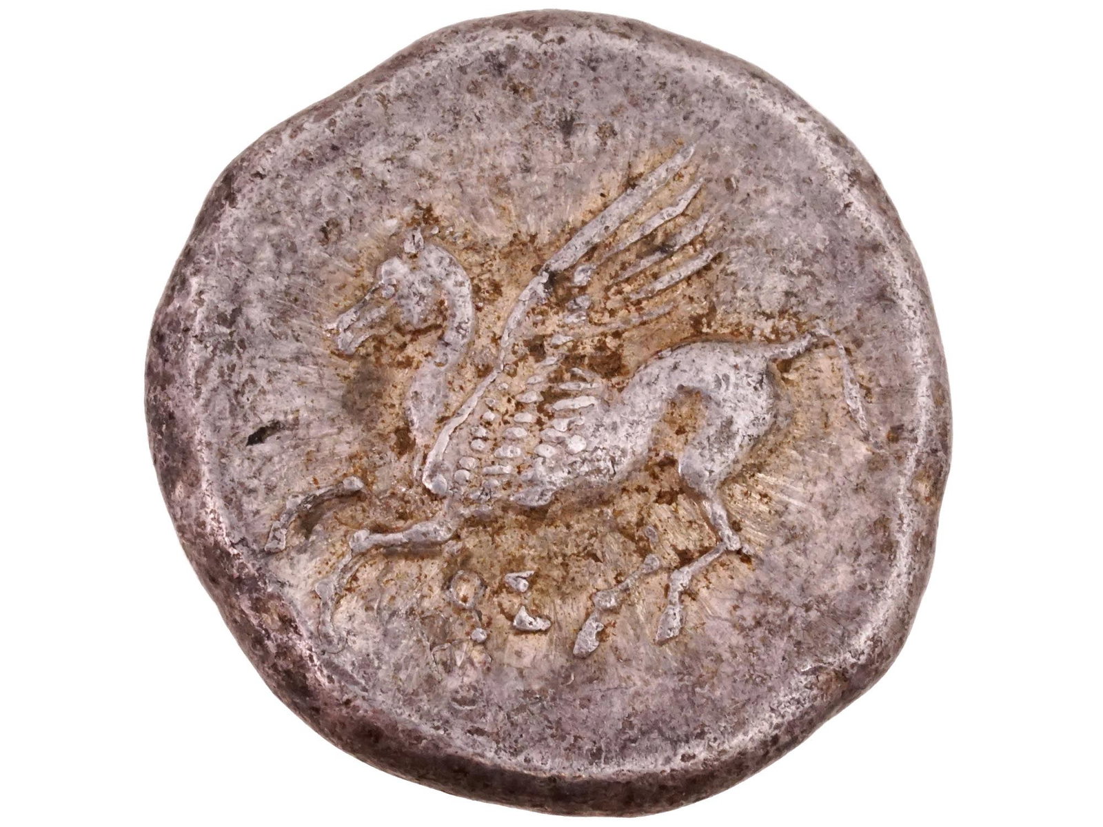 GREEK AKARNANIA ANAKTORION AR SILVER STATER COIN: A Greek Akarnania Anaktorion AR silver stater coin. Circa 320 to 280 BC. Contemporary re truck using original molding. Obverse depicts the Pegasos flying left. Reverse depicts the helmeted head of Ath
