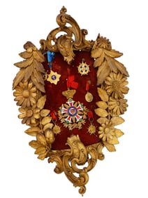 COLLECTION OF VARIOUS MEDALS ON WALL PLAQUE FRAMED