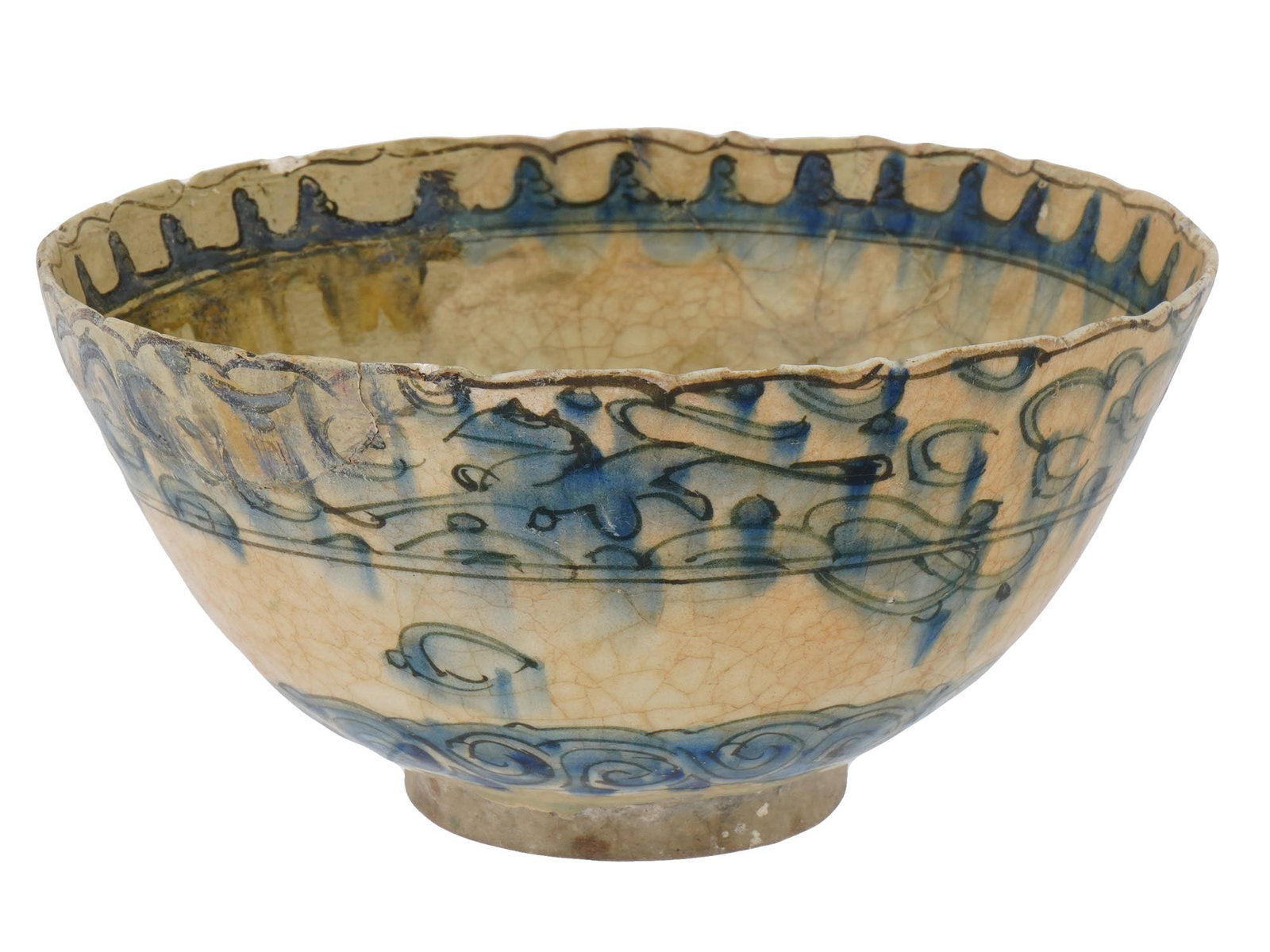 16TH CENTURY PERSIAN BLUE AND WHITE POTTERY BOWL: An antique Persian blue and white glazed ceramic pottery bowl. The exterior and interior of the ware is decorated with a hand enameled design representing scenes with mythological creatures over waves