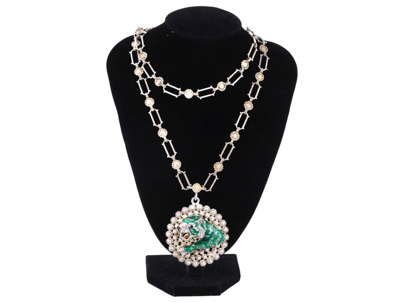 GUCCI STERLING SILVER ENAMEL TIGER LINK NECKLACE: A vintage sterling silver link necklace by Gucci. Studded design. Large round pendant with green and black enameled relief tiger. Marked Italy 925 on the backside. Total Weight: 104 grams. Provenance: