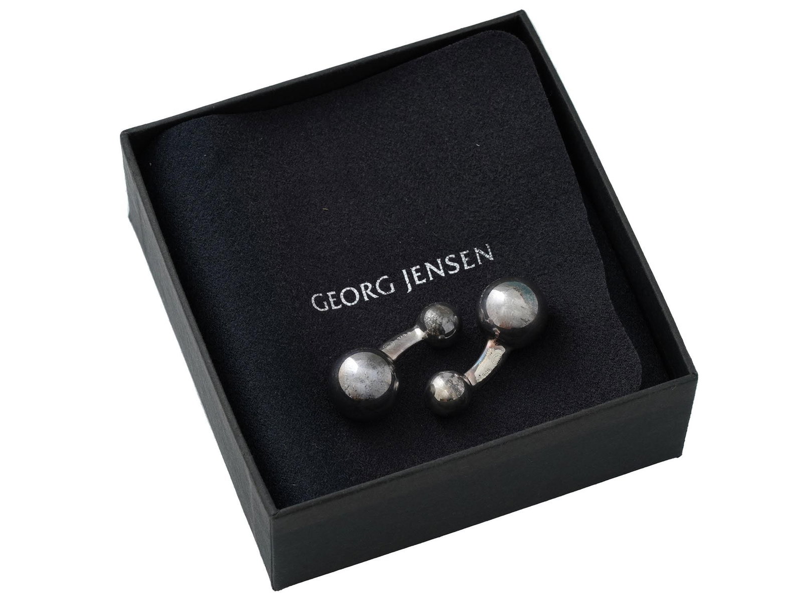 VINTAGE GEORG JENSEN STERLING SILVER CUFFLINKS IOB: A pair of vintage sterling silver whale-back cufflinks by Georg Jensen, a Danish jewelry and tableware company. Minimalist globe design. Hallmarks Georg Jensen, 925S, 608A are on the backing of both p