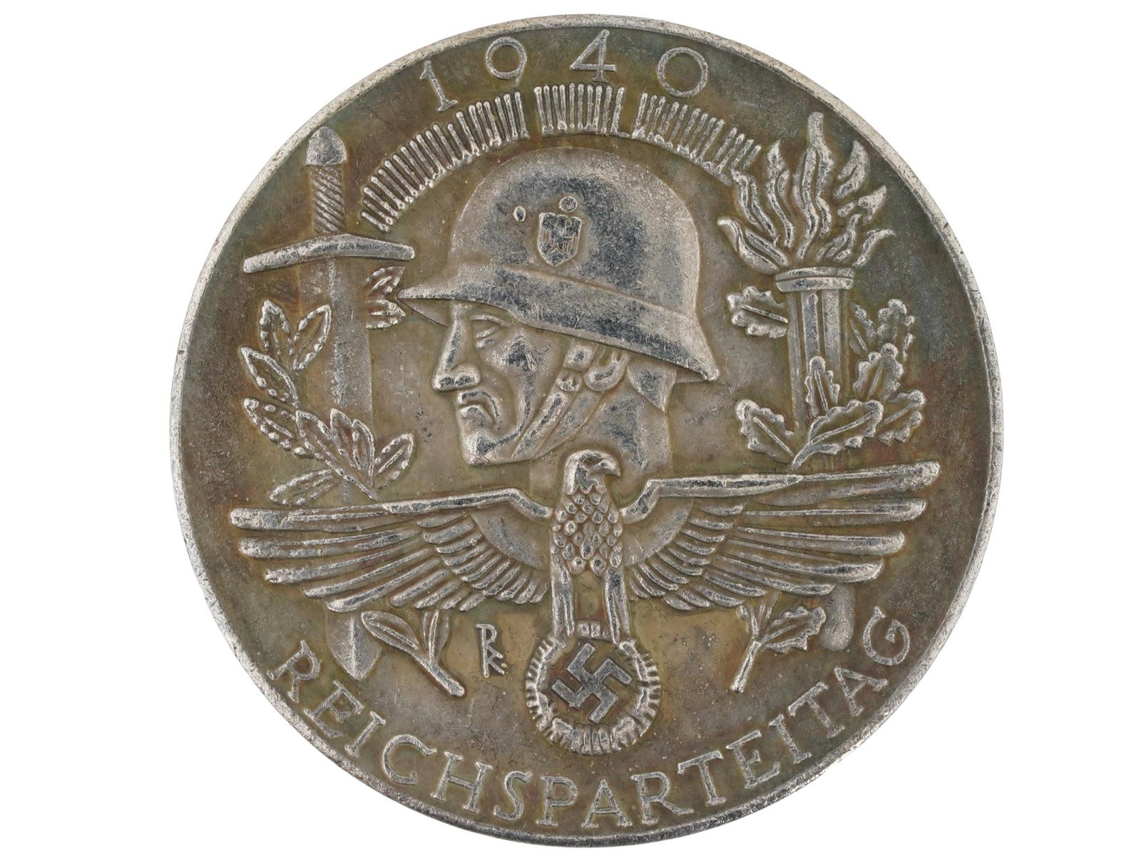 PRE WWII GERMAN THIRD REICH REICHSPARTEITAG MEDAL: A Pre WWII type German Third Reich Reichsparteitag medal. Commemorative medal dedicated to the Party Congress of the 3rd Reich 1940. The medal depicts a man in a helmet in the left profile. At the top