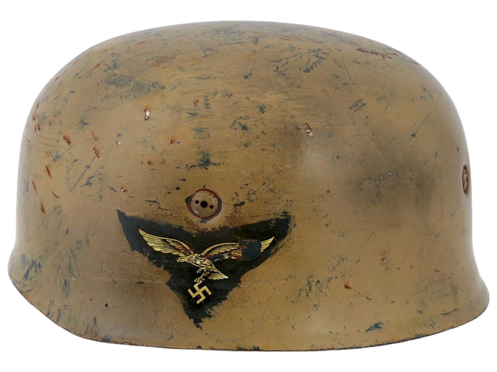 WWII MODEL GERMAN KARL HEISLER PARATROOPER HELMET: A WWII Nazi German model Nordland Luftwaffe military helmet. A steel helmet of yellow gray tone with leather inner and straps inside. The helmet is decorated with a Luftwaffe eagle clutching a swastik