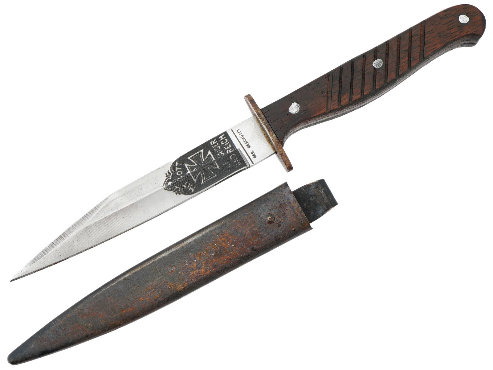 WWII TYPE NAZI GERMAN BOOT KNIFE W STEEL SCABBARD: A WWII type Nazi German boot knife with a brown wooden handle and a clip back steel scabbard. Marked with an engraved image of a scull surrounded by an inscription: Sturm Truppen. On the other side an