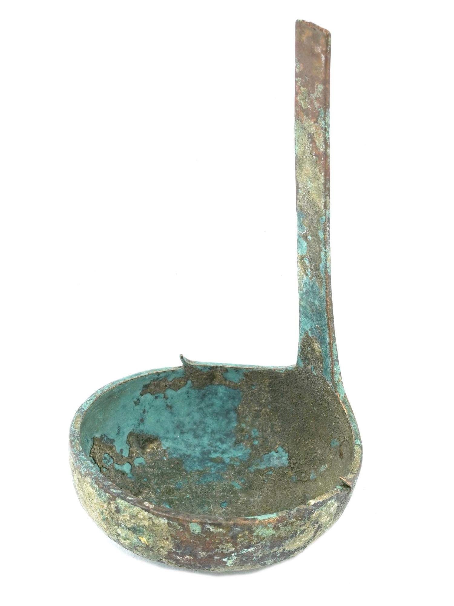 ANCIENT ROMAN BRONZE SPOON LADLE FRAGMENT: An Ancient Roman bronze spoon ladle fragment. Circa 2nd century AD. Ladle with a deep bowl and a vertical handle. The top of the handle is missing. Serveware, Cutlery And Flatware, Museum Pieces and H
