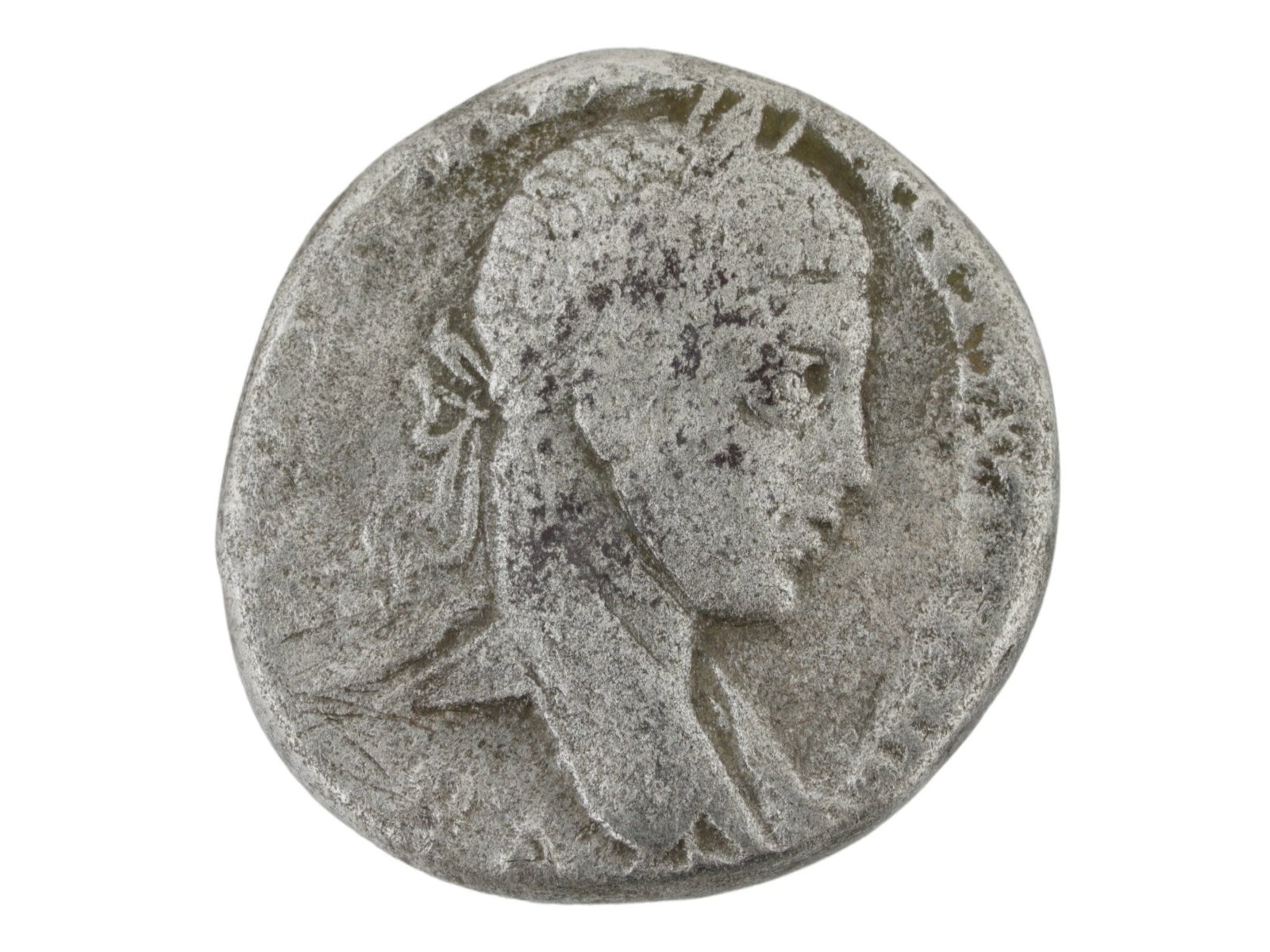 ANCIENT ROMAN 218 TO 222 SILVER TETRADRACHM COIN: An ancient Roman silver tetradrachm coin. Roman Empire, province of Syria, Elagabalus, 218 to 222, Tetradrachm. The obverse is the head of the emperor wearing a laurel wreath, turned to the right. The